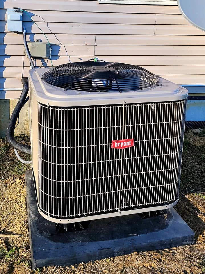 Bryant AC unit installed outside home