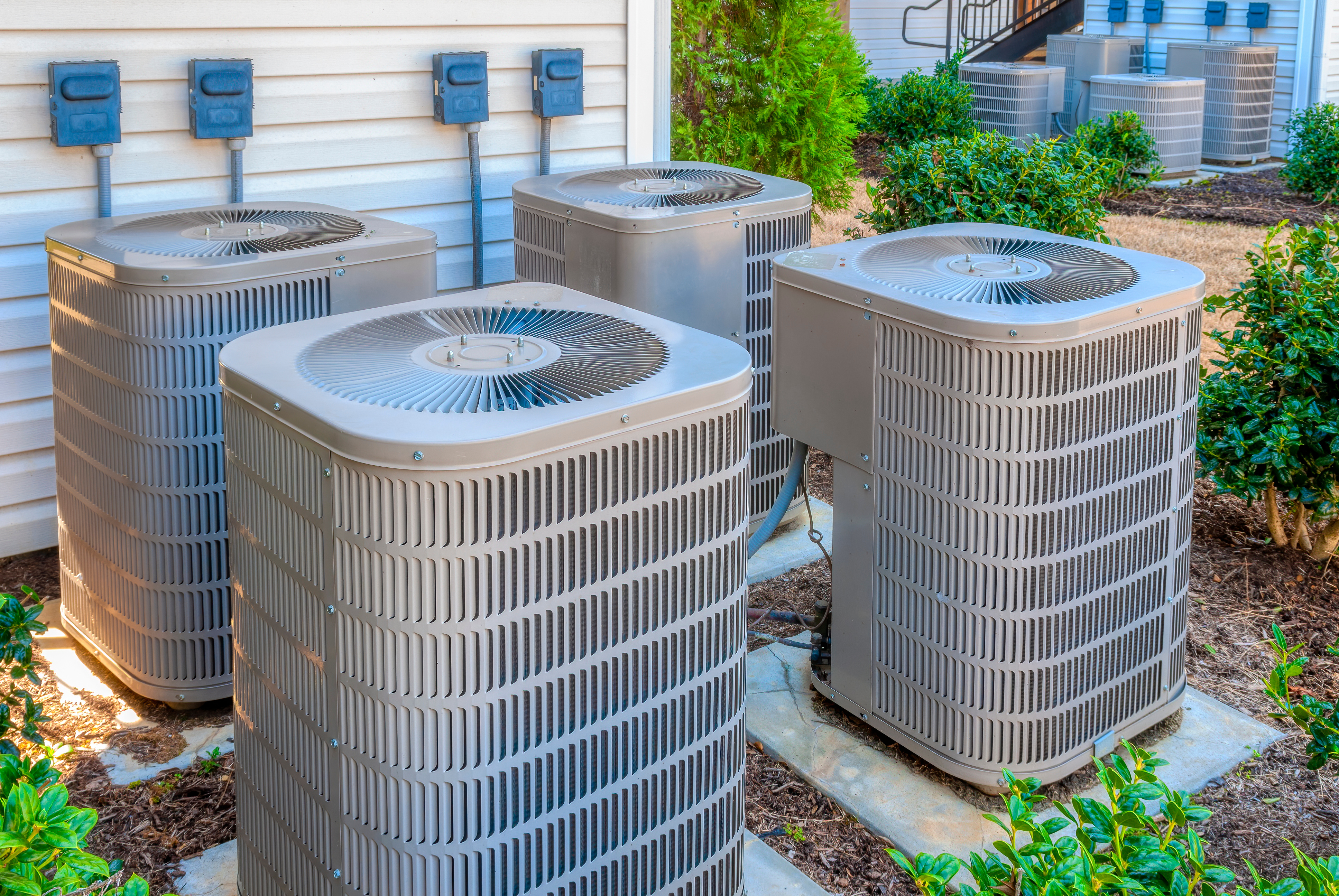 Multiple new HVAC units installed outside home